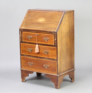 An Edwardian inlaid mahogany bureau, fall front revealing a fitted interior above 3 long graduated drawers raised on bracket feet 94cm h x 60cm w x 40cm d 