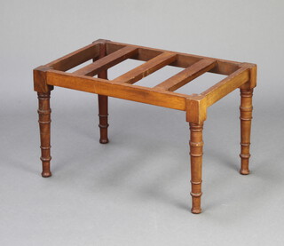 A Victorian rectangular mahogany slatted luggage rack, raised on turned supports 39cm h x 63cm w x 41cm d 