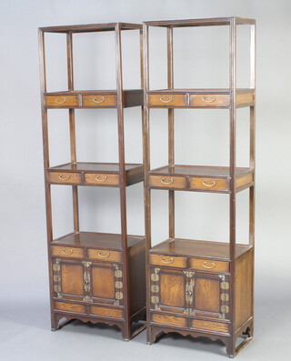 A pair of Oriental hardwood 3 tier what not stands fitted 6 short drawers above double cupboard 199cm h x 54cm w x 36cm d 