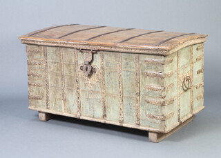An 18th/19th Century Indian hardwood coffer with hinged lid, iron banding and iron drop handles, the interior fitted a candle box, raised on square supports 67cm h x 128cm w x 69cm d  