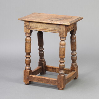 An 18th Century style bleached oak joined stool raised on turned and block supports with box framed stretcher 35cm h x 44cm w x 26cm d 