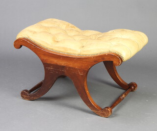 A Georgian style mahogany X framed stool the seat upholstered in bleached buttoned green leather 39cm h x 68cm w x 50cm d 