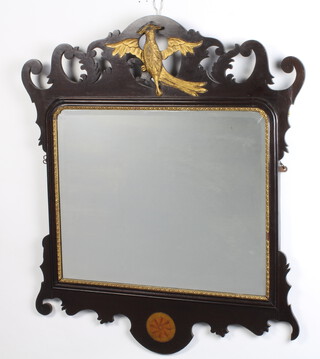 A Chippendale style rectangular plate mirror contained in an inlaid carved and pierced mahogany frame surmounted by an eagle 80cm x 70cm  