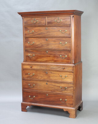 A Georgian mahogany chest on chest, the upper section with moulded and dentil cornice, canted corners, fitted 2 short and 3 long drawers with brass swan neck drop handles, base fitted shallow drawer above 3 long drawers, raised on bracket feet 186cm h x 109cm w x 53.5cm d 