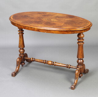 A Victorian inlaid quarter oyster walnut veneered and crossbanded stretcher table raised on turned supports with H framed stretcher 70cm h x 98cm w x 57cm d 