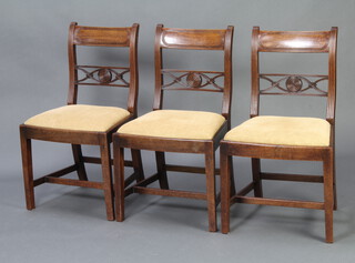 A set of 3 19th Century mahogany bar back dining chairs with pierced and carved mid rails, raised on square supports with H framed stretcher 