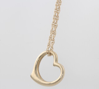 A 9ct yellow gold heart pendant and chain 2.6 grams 