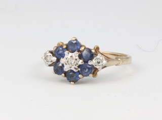 A 9ct yellow gold sapphire and diamond cluster ring 2.4 grams, size N 1/2