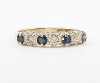 A 9ct yellow gold sapphire and diamond ring 1.3 grams, size J 0