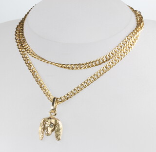 A 9ct yellow gold necklace 50cm and a yellow gold dogs head pendant 12.2 grams 