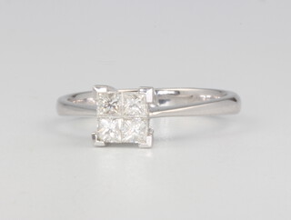 An 18ct white gold 4 stone princess cut diamond ring approx. 0.5ct, colour G/H, clarity VS, size O