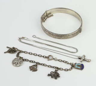 A silver bangle and minor silver jewellery, 34 grams