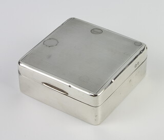 A silver engine turned cigarette box Birmingham 1937, 8cm 