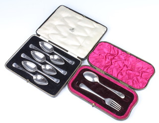 A cased set of 6 silver grapefruit spoons Sheffield 1934 and a cased fork and spoon Sheffield 1915, 162 grams