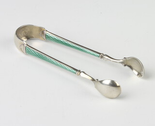 A pair of Continental silver and guilloche enamel sugar tongs, 20 grams