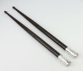 A pair of silver mounted hardwood drum sticks, 41cm 
