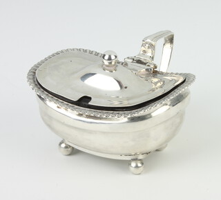 A Victorian silver mustard on ball feet London 1898 together with a blue glass liner (stuck) 
