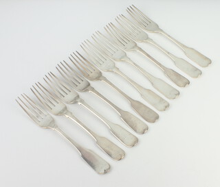 Ten Georgian silver fiddle pattern table forks, mixed dates and rubbed marks, 700 grams