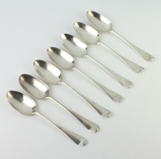 A matched set of 7 Georgian silver table spoons, mixed dates and rubbed marks, 460 grams
