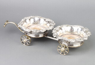 A Victorian silver plated 2 section decanter wagon with scroll rims with 4 spoked wheels and carrying handle, 46cm 