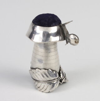 A Continental novelty silver pin cushion in the form of a toadstool with a leaf base and climbing snail 6cm, gross weight 30 grams 