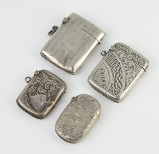 An Edwardian silver engraved vesta and 3 others, 71 grams