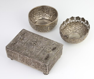 An Indian filigree silver rectangular box raised on scroll feet 13cm, 2 ditto bowls 602 grams 