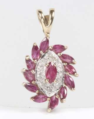 A 9ct yellow gold ruby and diamond pendant, 20mm, 1.4 grams 