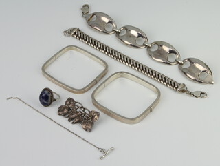 A silver bracelet and minor silver jewellery 148 grams 