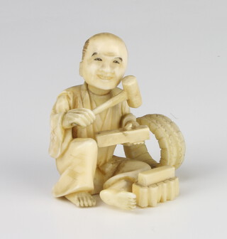 A Meiji period carved Japanese ivory figure of a seated tradesman, signed 6cm 