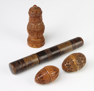 A 19th Century Continental turned wood needle case, a coquilla nut needle holder 12cm and 2 pomanders