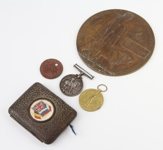 A World War One pair of medals to 7538 Pte. T.Taylor.L.N.Lan.R together with a death plaque, dog tag and hammer patterned WWI cigarette case 