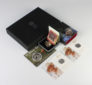 2018 a United Kingdom coinage Royal Shield of Arms proof collection no.6489 of 20000, the proof memorial crown, her Majesty Queen Elizabeth The Queen Mother 1900-2002, 4 other commemorative silver crowns 
