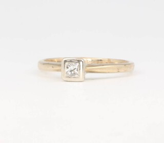 A 9ct yellow gold princess cut diamond ring 0.15ct, 1.5 grams, size J 