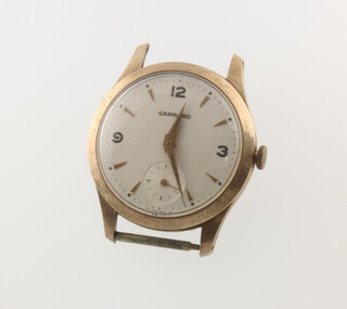 A gentleman's 9ct yellow gold Garrards wristwatch with seconds at 6 o'clock, contained in a 32mm case 