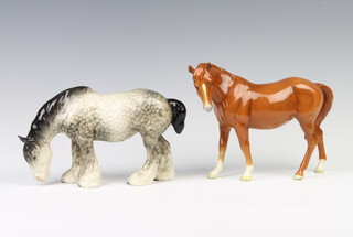 A Beswick figure of a mare facing left, chestnut gloss 17.2cm together with a grazing shire, rocking horse grey 14cm both modelled by Arthur Gredington 