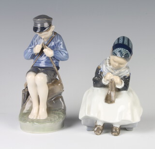 A Royal Copenhagen figure of a girl sewing 1314 14cm, ditto of a young boy whittling 905 17cm 