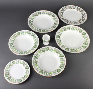 A Wedgwood Strawberry Hill pattern part dinner service comprising 5 dinner plates, 12 side plates (1 chipped) together with a Wedgwood Santa Clara part dinner service - 6 dinner plates, 11 side plates, 3 dessert bowls, 7 soup bowls (1 cracked), 2 saucers, 1 ashtray (cracked), cream jug, 3 egg cups (1 chipped) and  2 oval meat plates 
