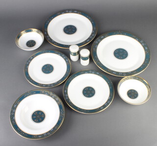 A Royal Doulton Carlyle pattern part dinner service comprising 12 dinner plates (2 seconds), 18 medium plates (7 seconds), 9 small plates, 8 dessert bowls, 7 soup bowls (1 second) and 2 condiments 