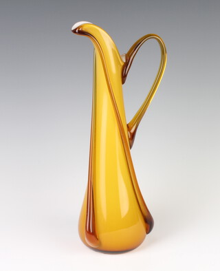 A Murano style orange ground glass jug 33cm 