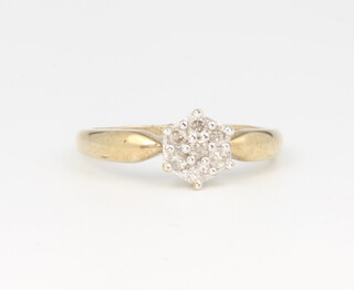 A 9ct yellow gold diamond cluster ring 0.25ct, 1.9 grams, size M 1/2