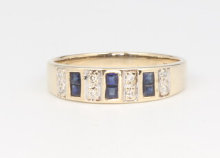 A 9ct yellow gold princess cut sapphire and brilliant cut diamond ring 2.1 grams, size P 1/2