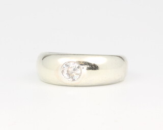 A 9ct white gold gypsy set single stone diamond ring, approx 0.25ct, 5.4 grams, size M 