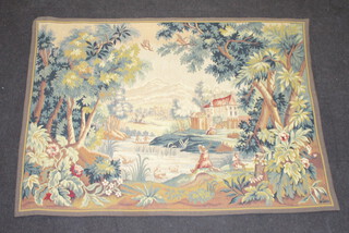 A machine made tapestry hanging decorated mountain scape, building and figures 126cm x 173cm