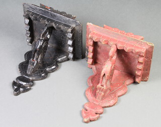 A pair of Indian carved and painted hardwood brackets supported by figures of pelicans in their piety 35cm x 30cm x 21cm 