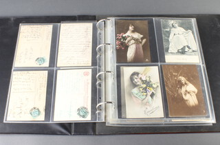 A collection of 1920's black and white postcards of beauties 