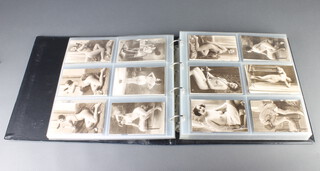An album of reproduction 1920's erotic black and white postcards 