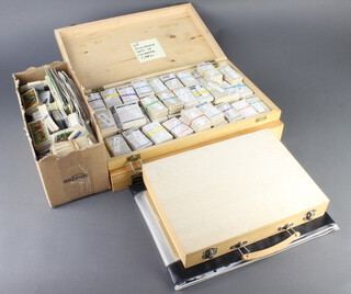 Two wooden shallow boxes containing a collection of cigarette cards including Churchman's, John Players, Wills, a box containing 7 albums, 1 other containing tea cards, a Festival of Britain programme and ephemera relating to White City Stadium 
