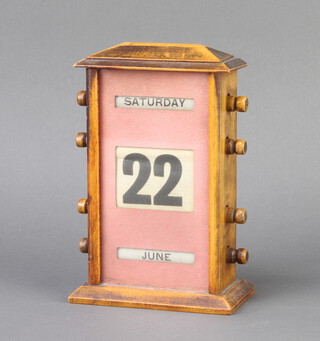 A 19th Century perpetual calendar contained in a beech case 13cm x 13cm x 7.5cm 