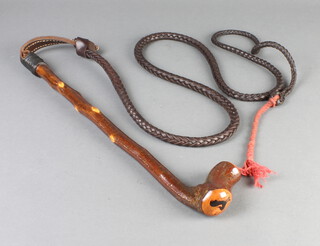 A hunting whip with shalaylee style handle and woven leather lash, the whip is 45cm, the leather lash 159cm 
